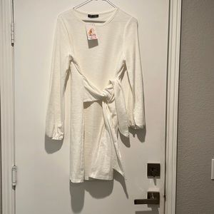 White long sleeve tie dress
